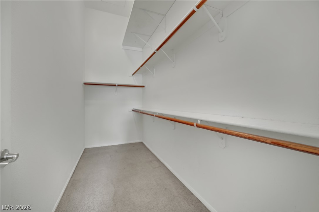 2305 West Horizon Ridge Parkway, Unit 2722 Henderson, NV 89052 - Photo 13 of 23 Walk in closet with light carpet