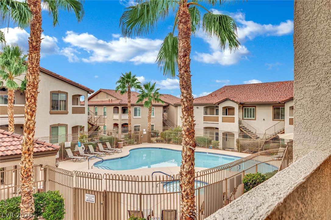 2305 West Horizon Ridge Parkway, Unit 2722 Henderson, NV 89052 - Photo 17 of 23 Community pool with a patio area and a residential view