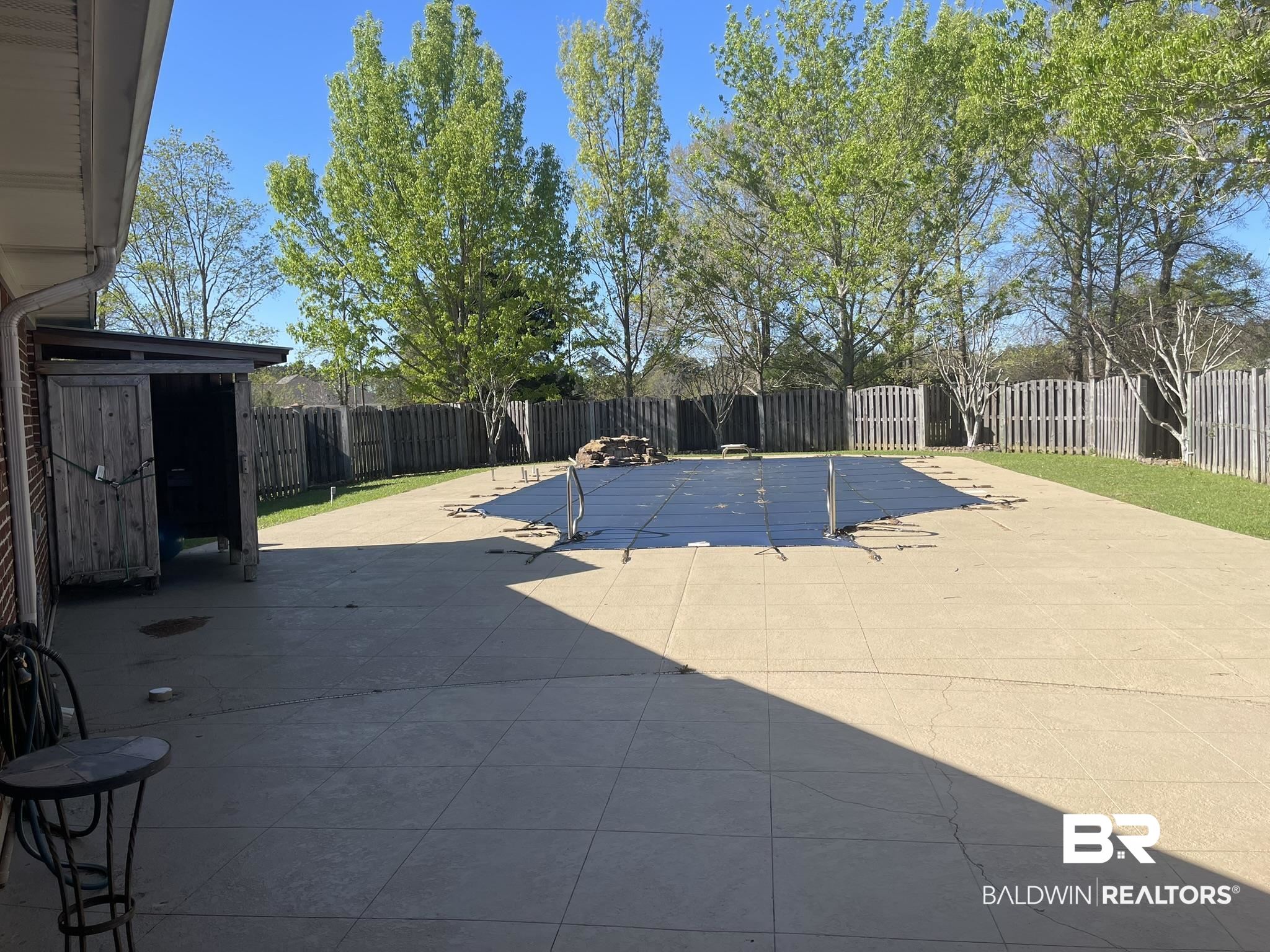 35405 Pine Road South Stapleton, AL 36578 - Photo 23 of 29 View of pool with patio surround and a fenced backyard
