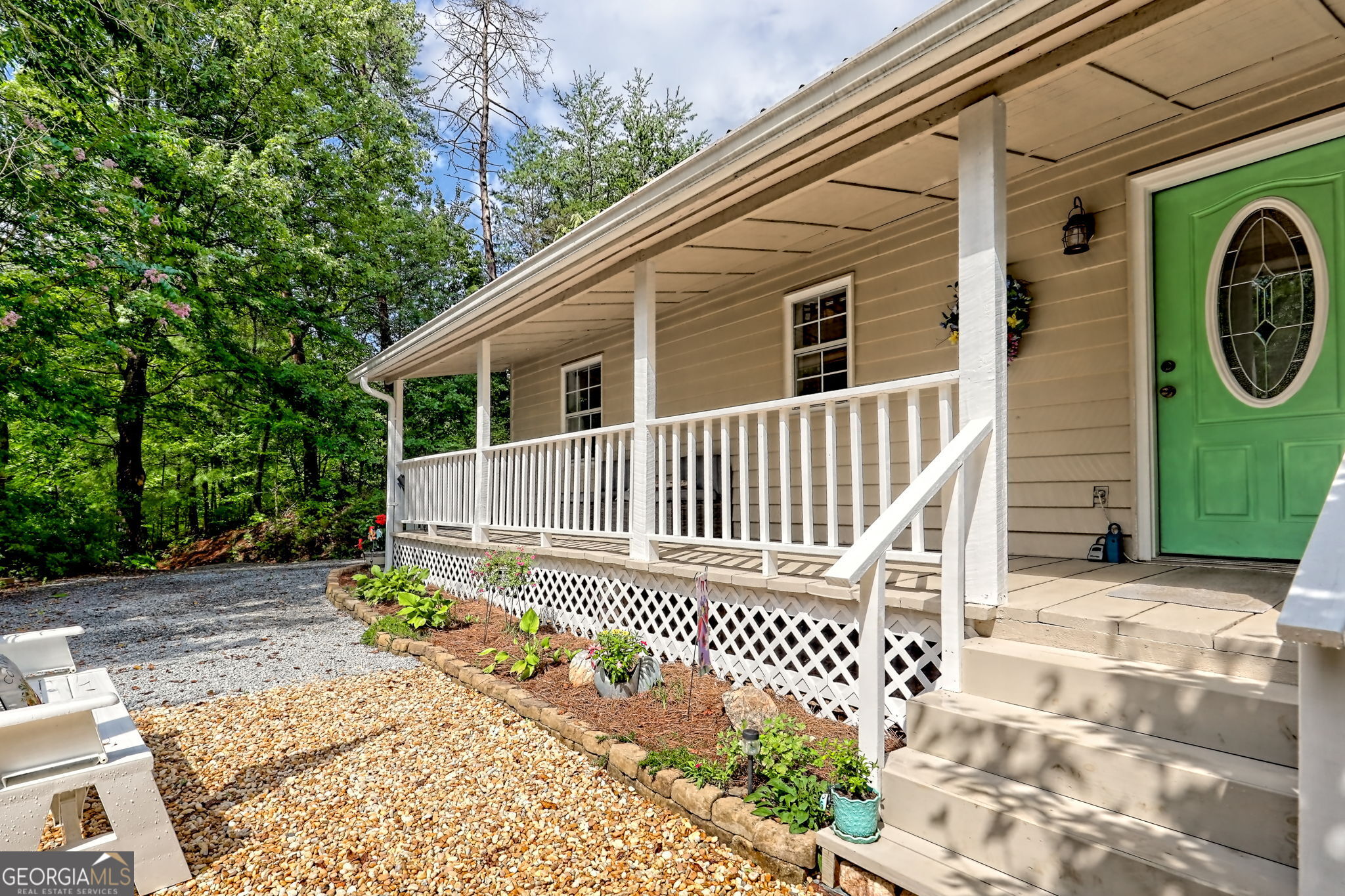 5647 Old 441 South Tiger, GA 30576 - Photo 1 of 1 a front view of a house with garden