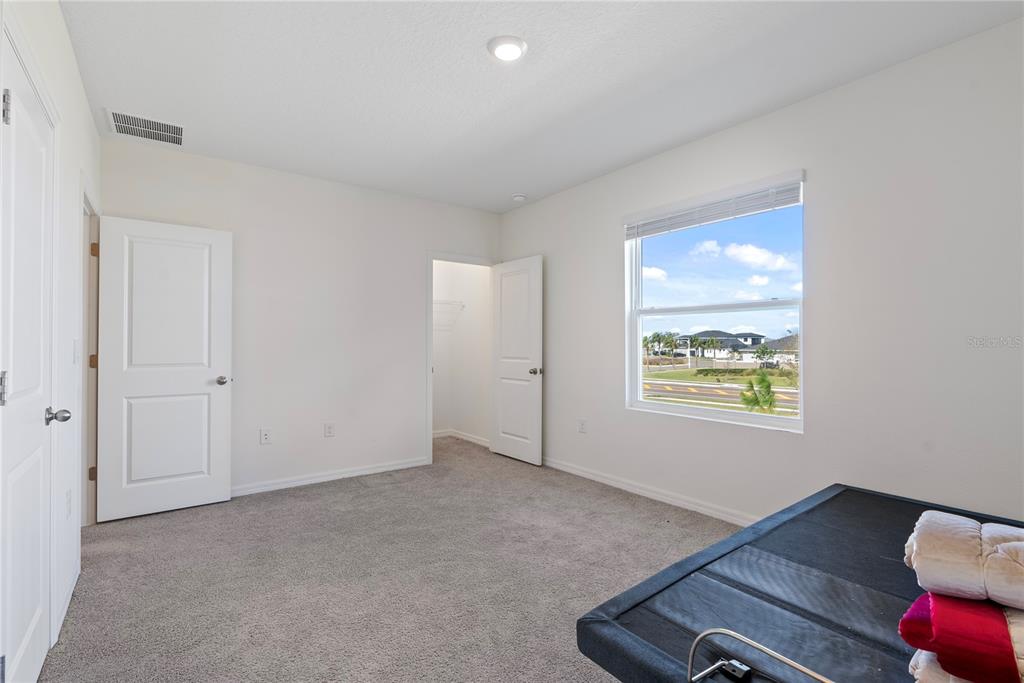 32395 Turtle Grace Loop Wesley Chapel, FL 33545 - Photo 12 of 39 a view of livingroom with furniture and window