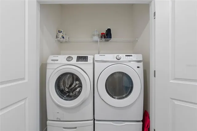 a utility room with dryer and washer
