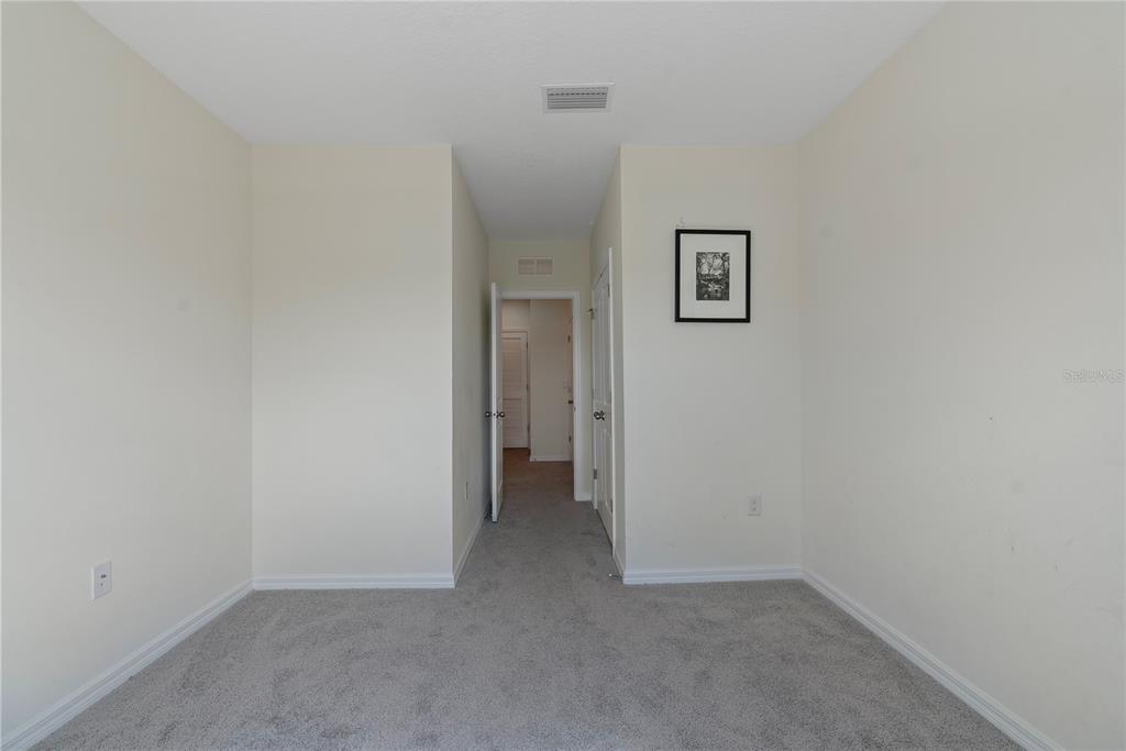 32395 Turtle Grace Loop Wesley Chapel, FL 33545 - Photo 19 of 39 a view of an empty room