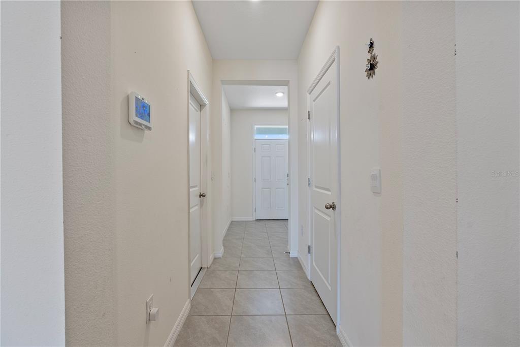 32395 Turtle Grace Loop Wesley Chapel, FL 33545 - Photo 2 of 39 a view of a hallway