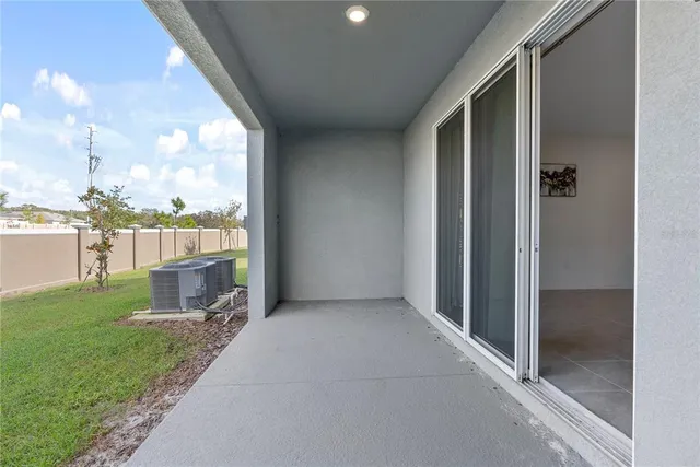 a bathroom with a granite countertop sink toilet a mirror a bathtub and shower