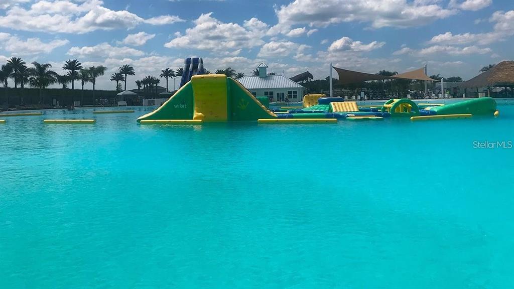 32395 Turtle Grace Loop Wesley Chapel, FL 33545 - Photo 39 of 39 a view of a lake with houses