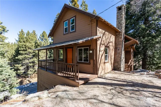 a view of a house with a roof deck