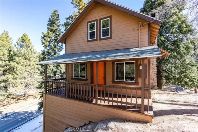 a front view of a house with balcony