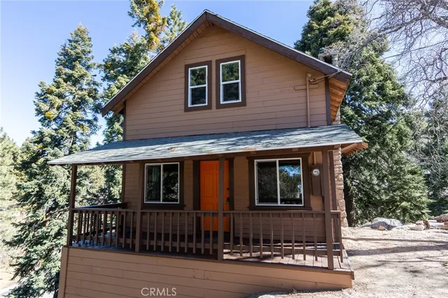 a view of a tree with a yard