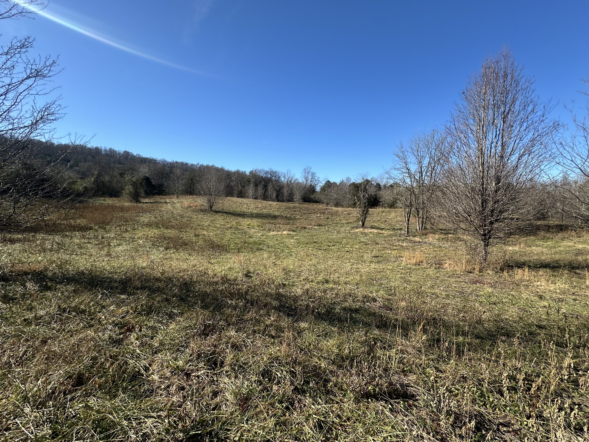 a view of mountain with lake view