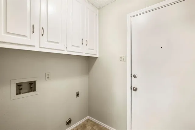a view of a livingroom with a ceiling fan and window