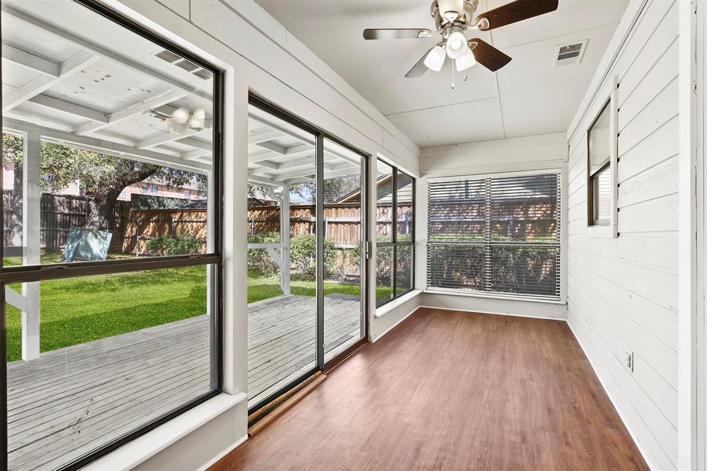 1916 Everglade Court Grapevine, TX 76051 - Photo 16 of 35 a view of room with window and wooden floor