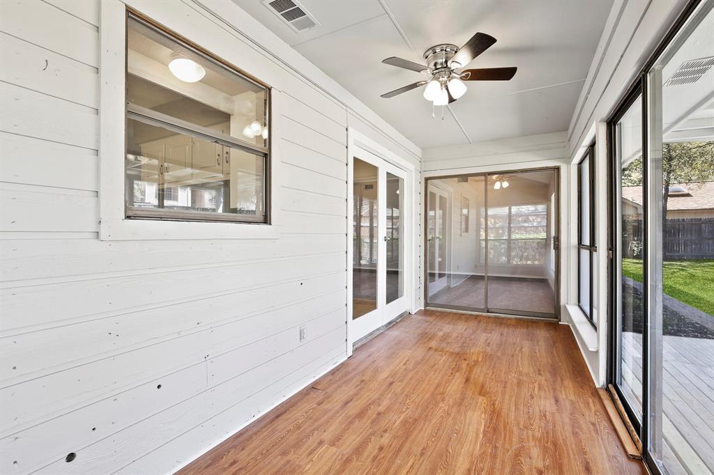 1916 Everglade Court Grapevine, TX 76051 - Photo 18 of 35 a view of a livingroom with a ceiling fan and window