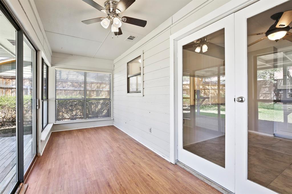 1916 Everglade Court Grapevine, TX 76051 - Photo 19 of 35 a view of an entryway with wooden floor and door