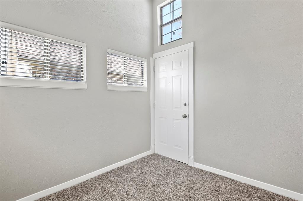 1916 Everglade Court Grapevine, TX 76051 - Photo 26 of 35 a view of an empty room with a window