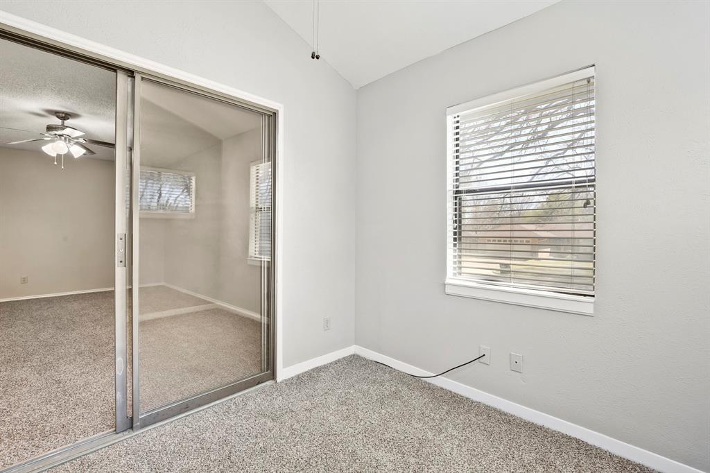 1916 Everglade Court Grapevine, TX 76051 - Photo 28 of 35 a view of an empty room with closet and a window