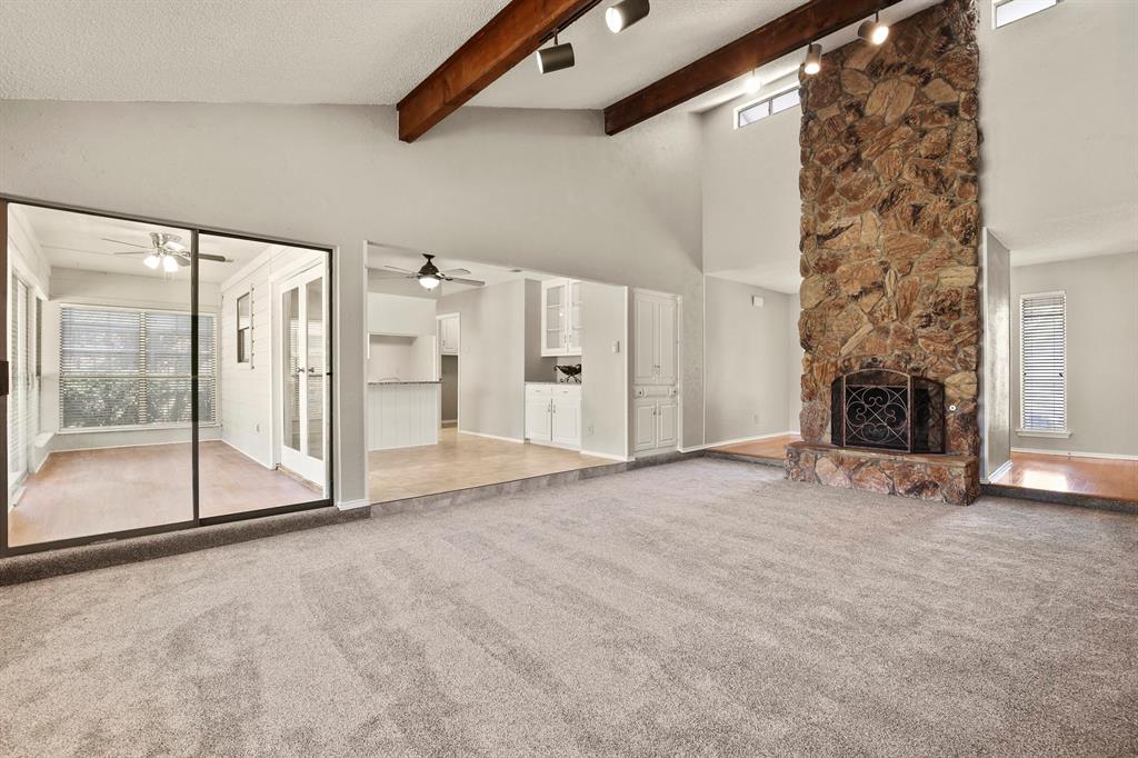 1916 Everglade Court Grapevine, TX 76051 - Photo 7 of 35 a view of an empty room with a fireplace