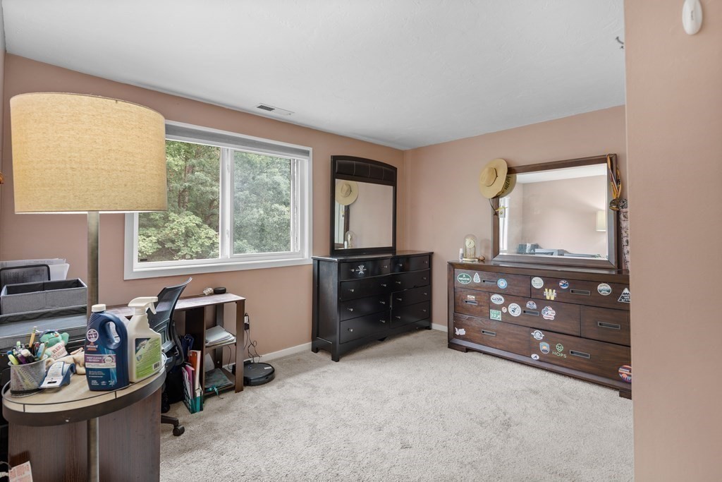 189 Littleton Road, Unit 44 Chelmsford, MA 01824 - Photo 12 of 20 a room with furniture and window