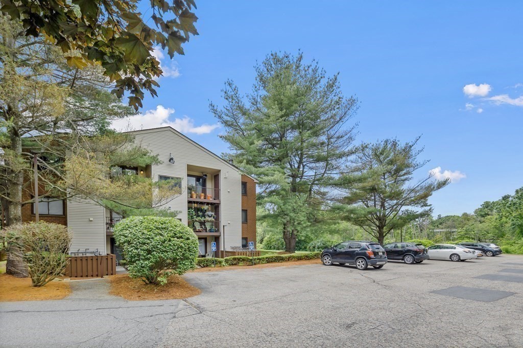 189 Littleton Road, Unit 44 Chelmsford, MA 01824 - Photo 18 of 20 a view of a street with a building and a street view