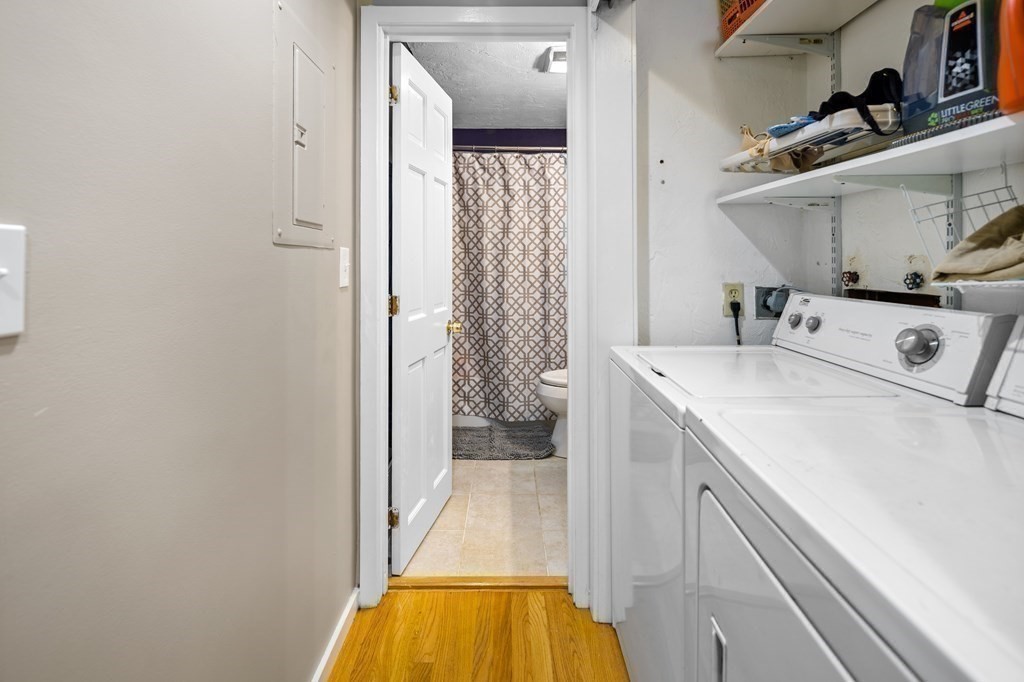 189 Littleton Road, Unit 44 Chelmsford, MA 01824 - Photo 6 of 20 a utility room with dryer and washer