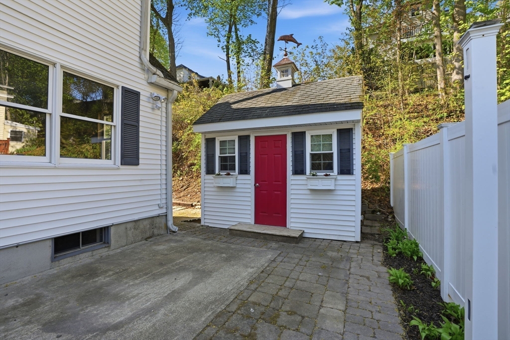 67 Wituwamat Road Weymouth, MA 02191 - Photo 38 of 42 a view of a house with a garage