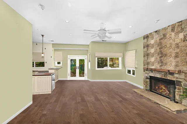 a view of a kitchen with a stove cabinets and a fireplace