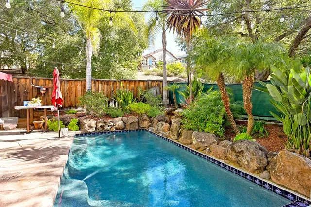 a view of a chairs and tables in the patio