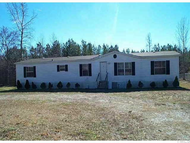 2073 Wiley Road Spring Hope, NC 27882 - Photo 1 of 1 a view of a house with a yard