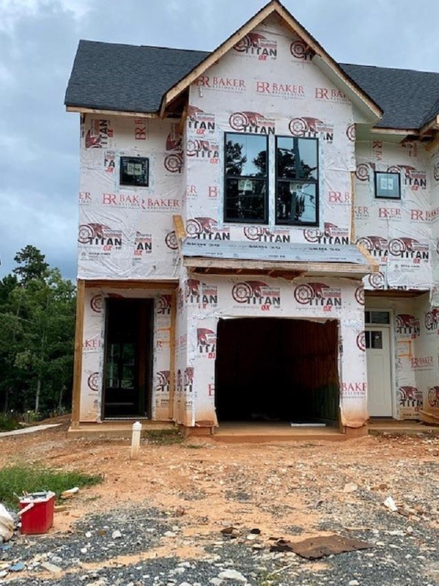 3808 Milltown Ridge Run Raleigh, NC 27612 - Photo 3 of 21 Beautiful Modern Farmhouse exterior with white James Hardee plank Color Block Plus, black windows, black brick accents and upgrade Mahogany 8' door. Front Exterior