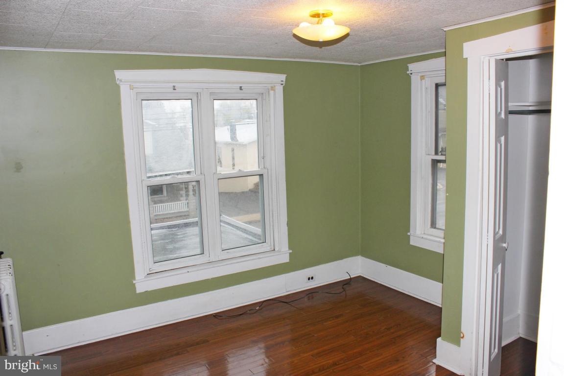 2 Twin Brook Road Lititz, PA 17543 - Photo 11 of 29 an empty room with wooden floor closet and windows