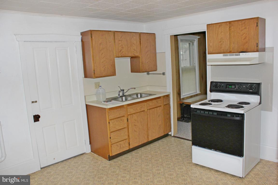 2 Twin Brook Road Lititz, PA 17543 - Photo 17 of 29 a kitchen with a stove sink and cabinets