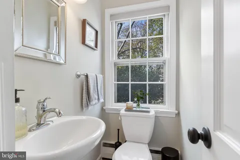 a bathroom with a sink and a toilet