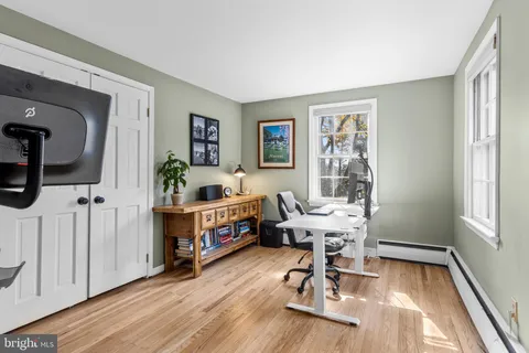 a workspace with wooden floor