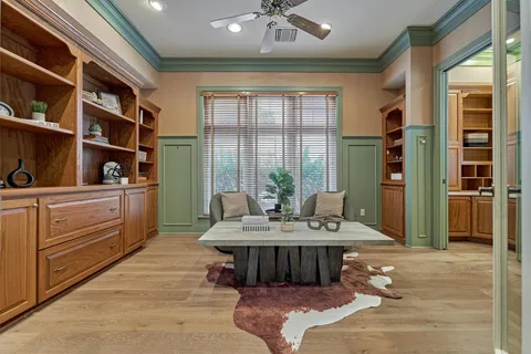 a view of a bathroom with a glass door and shower