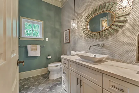 a bathroom with a sink and a toilet