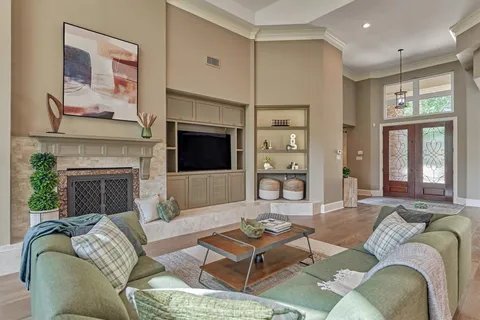 a bathroom with a granite countertop toilet a sink and mirror