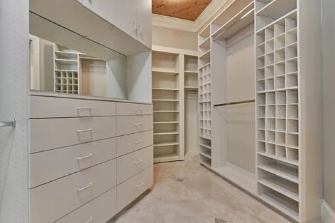a view of an empty walk in closet