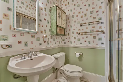 a bathroom with a sink and a toilet