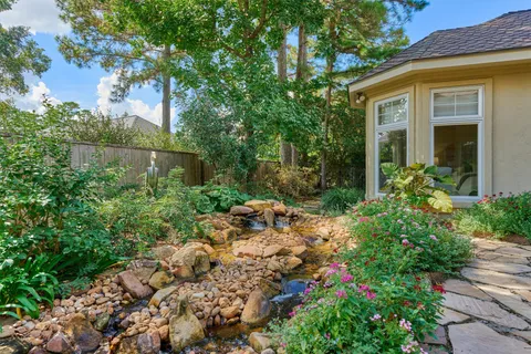 a small garden covered with trees