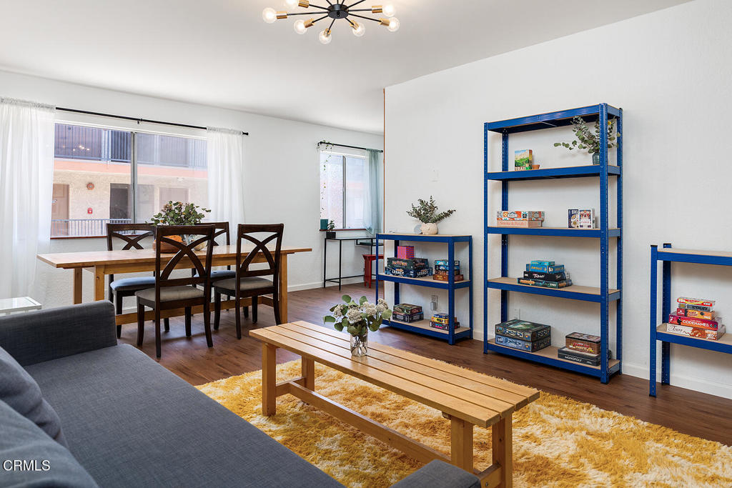 a room with furniture and a book shelf