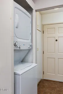 a bathroom with a sink a mirror and shower