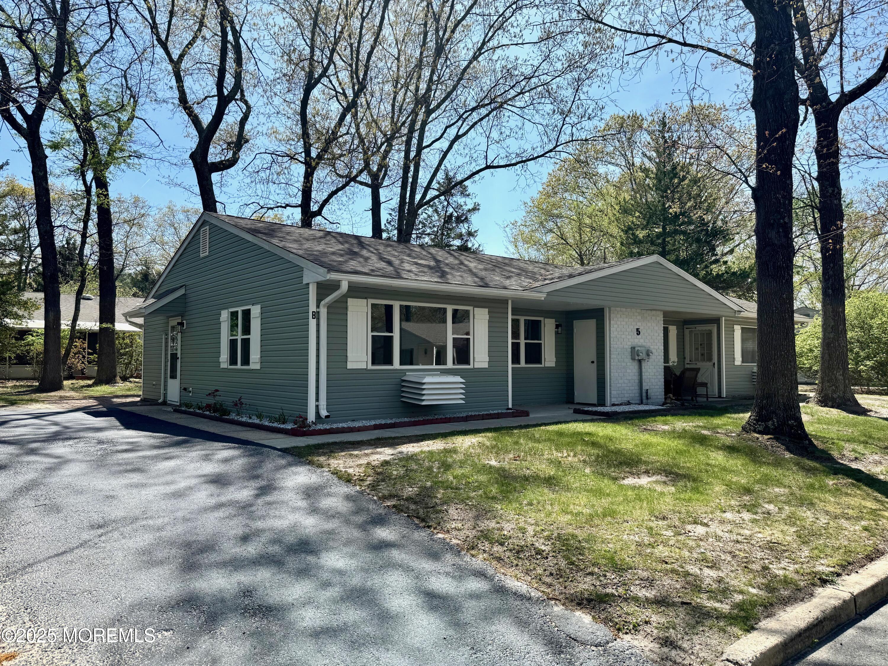 5 Nevada Drive Whiting, NJ 08759 - Photo 1 of 44 a view of a house with a yard