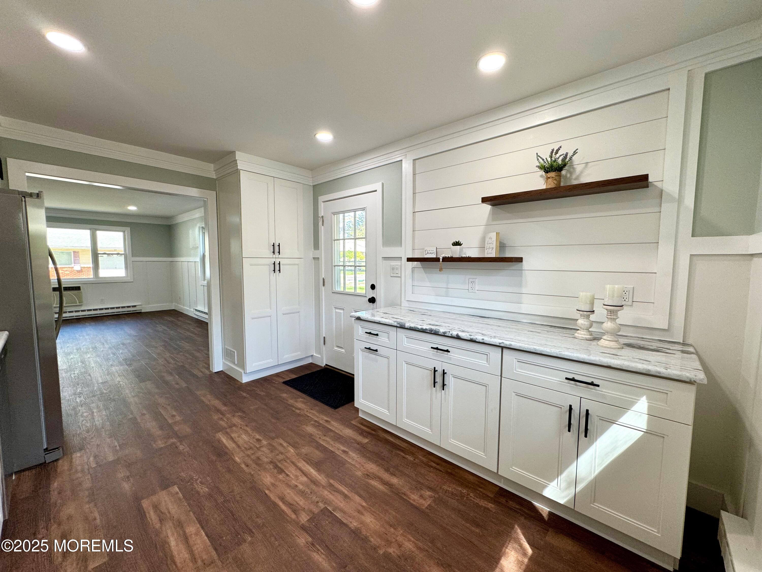 5 Nevada Drive Whiting, NJ 08759 - Photo 14 of 44 a kitchen with granite countertop a sink cabinets and wooden floor