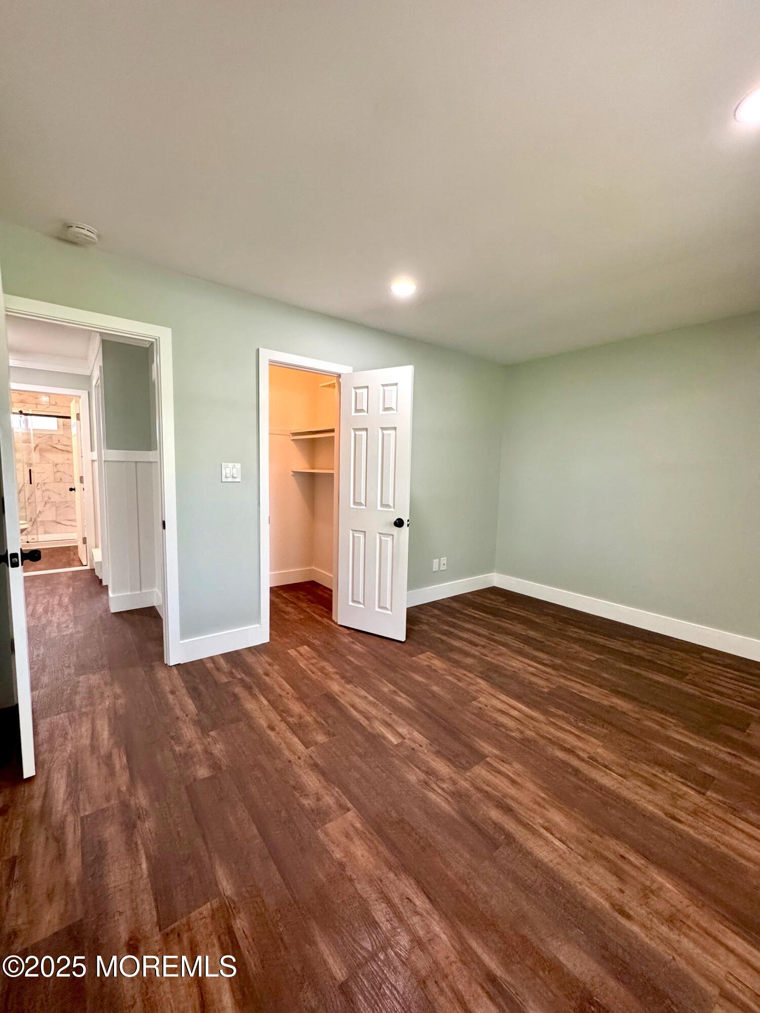 5 Nevada Drive Whiting, NJ 08759 - Photo 36 of 44 wooden floor in an empty room with a window