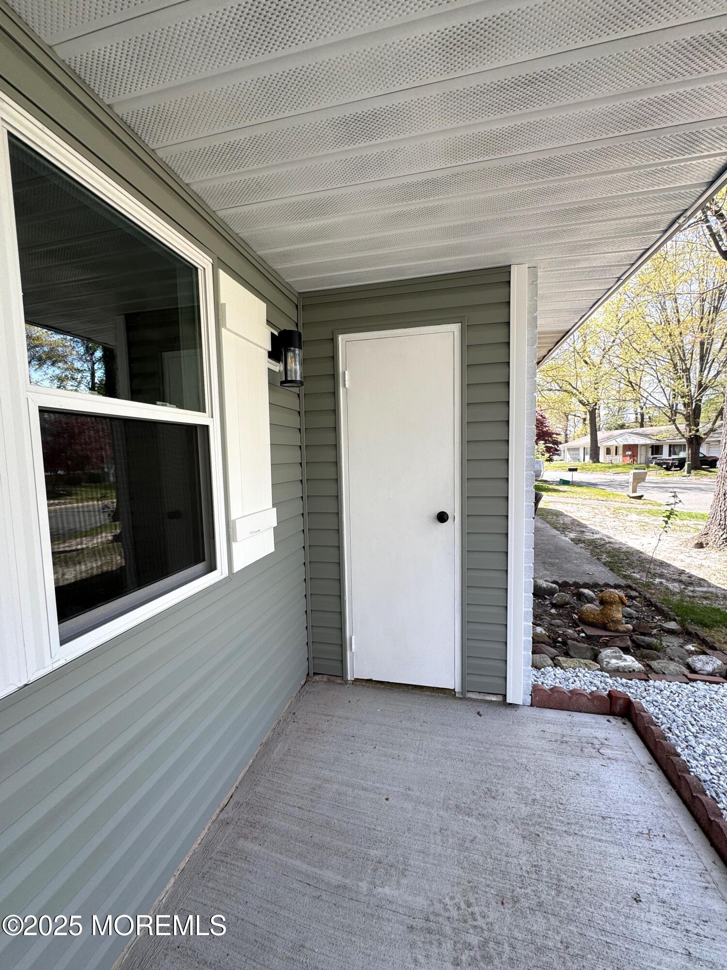5 Nevada Drive Whiting, NJ 08759 - Photo 40 of 44 a view of an empty room with a fireplace and a window