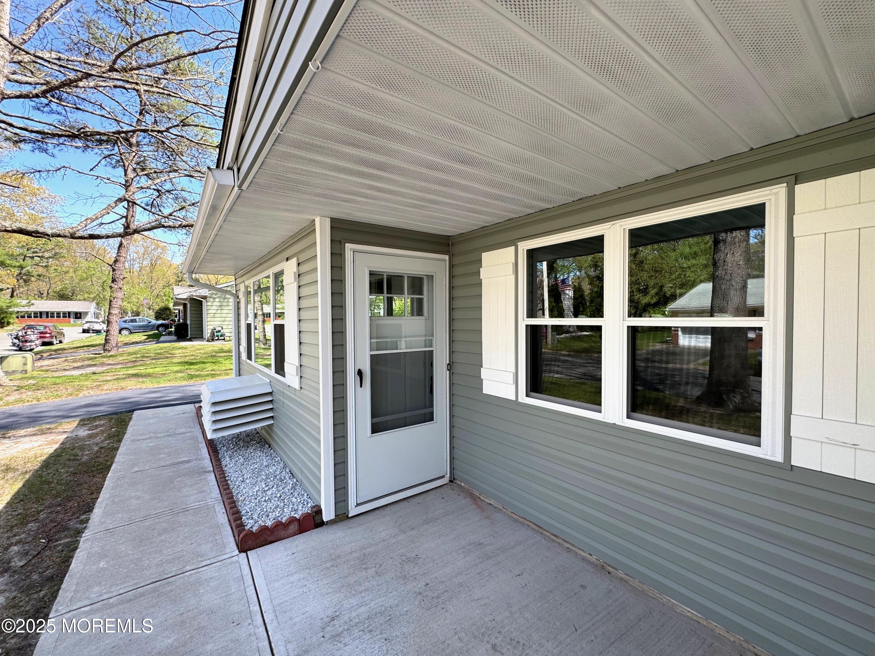 5 Nevada Drive Whiting, NJ 08759 - Photo 6 of 44 a view of a house with a swimming pool