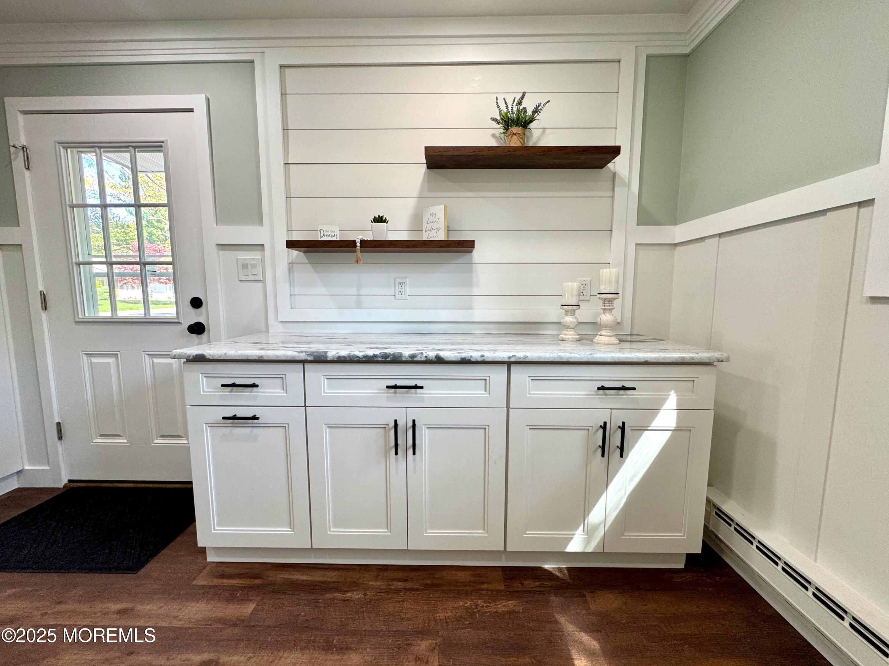 5 Nevada Drive Whiting, NJ 08759 - Photo 8 of 44 a kitchen with stainless steel appliances a sink and cabinets