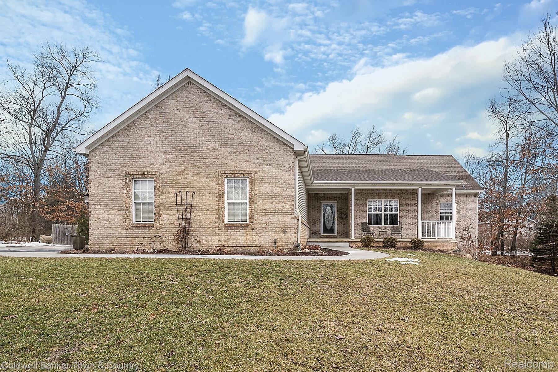 812 North Hughes Road Howell, MI 48843 - Photo 1 of 60 812 N Hughes, blue sky.JPG