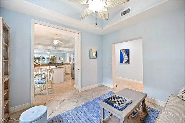 a living room with a couch and a table