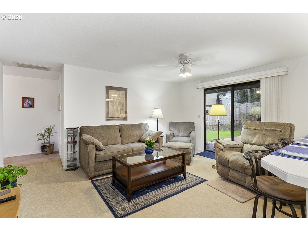 3788 Southeast 25th Street Gresham, OR 97080 - Photo 13 of 35 a living room with furniture and a large window